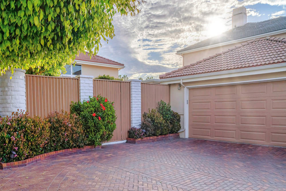 Why Fence Painting Helps Prevent Sun Damage and Wood Rot in San Diego